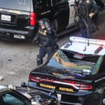 Feds charge 12 in alleged violence, attacks on police during immigration protests